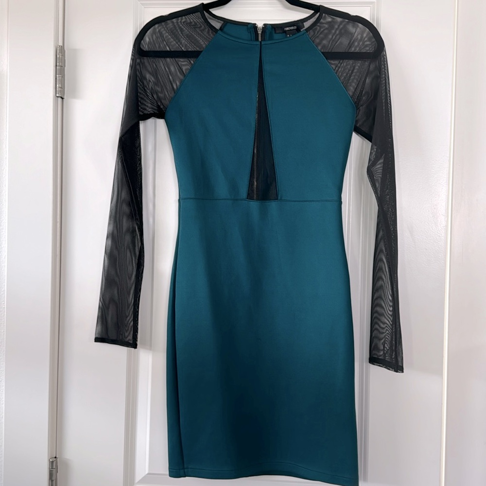 Turquoise mini dress with mesh center and sleeves
